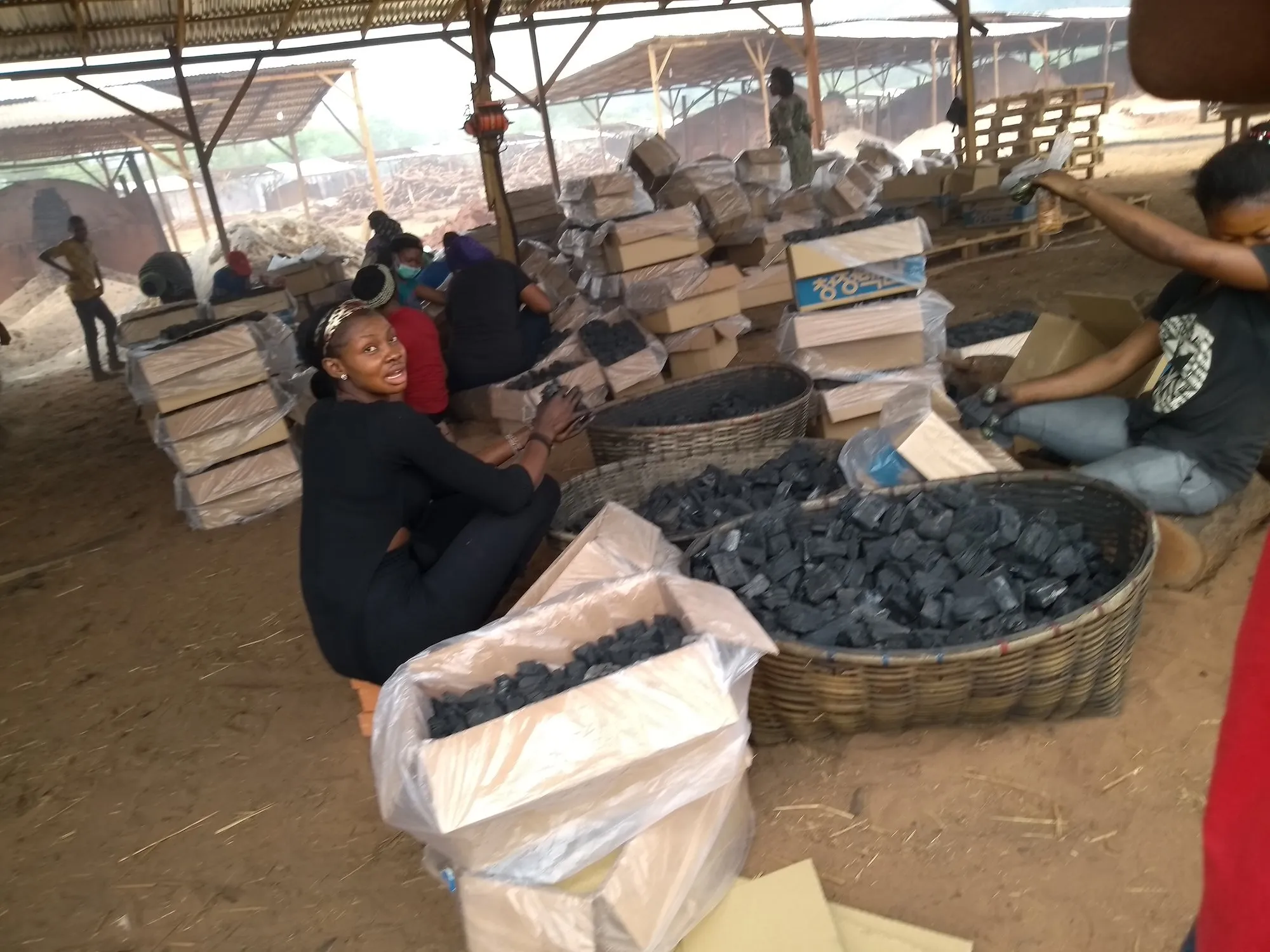 Charcoal produced by Kwo-Chief Investment in Obimo is packaged and exported to South Korea. Photo: SaharaReporters Media.